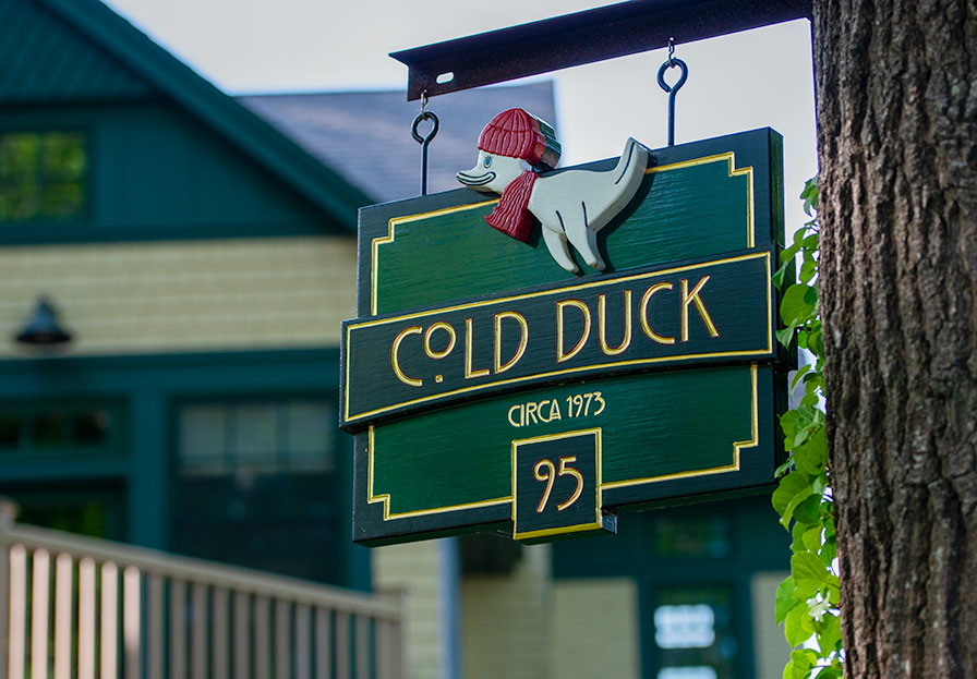 Cold Duck sign featuring a customer's wimsey
