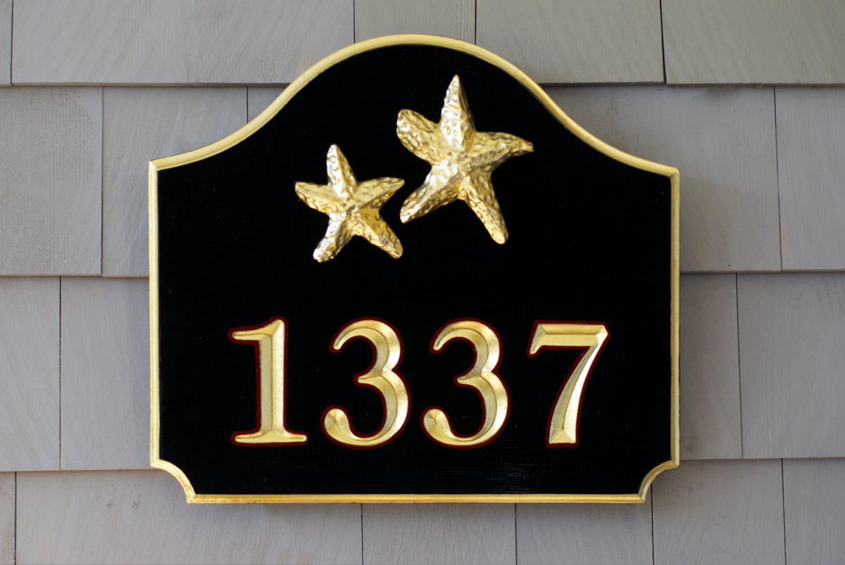 23k gold leaf home sign with carved starfish also gilded with gold