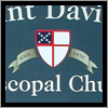 This sign for Saint David's Church in Kennebunk has a hand painted background, cut out vinyl letters and a printed crest and banner.