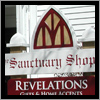This sign for Sanctuary Shops in Ogunquit, Maine incorporates stained glass into its design.