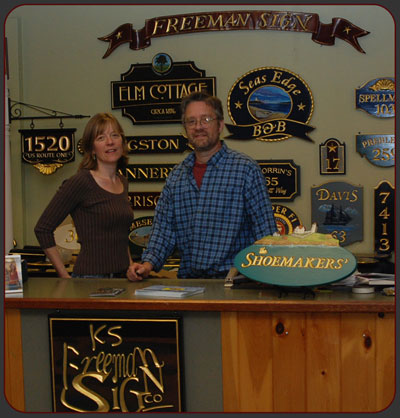 Kevin and Sandra Freeman serve sign customers at Freeman Sign in York, Maine